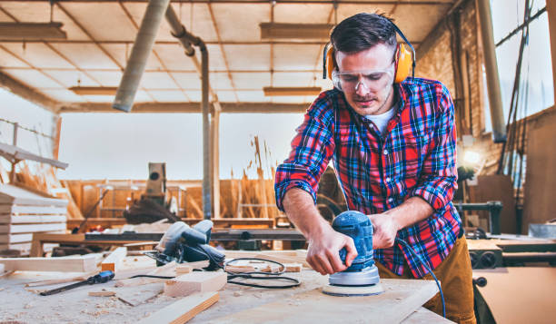 istock Carpenter At Work Polishing Wood 1143580133