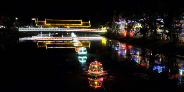 istock covered bridge over a small river, night lighting, neon lights 1143585168