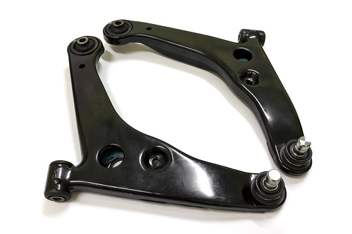 Front lower control arm for Japanese car on white background, isolated.