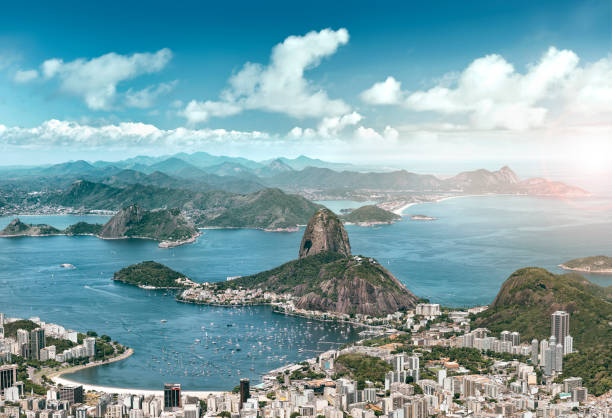 aerial view of rio de janeiro brazil with guanabara bay and sugar loaf - rio de janeiro guanabara bay sugarloaf mountain beach imagens e fotografias de stock