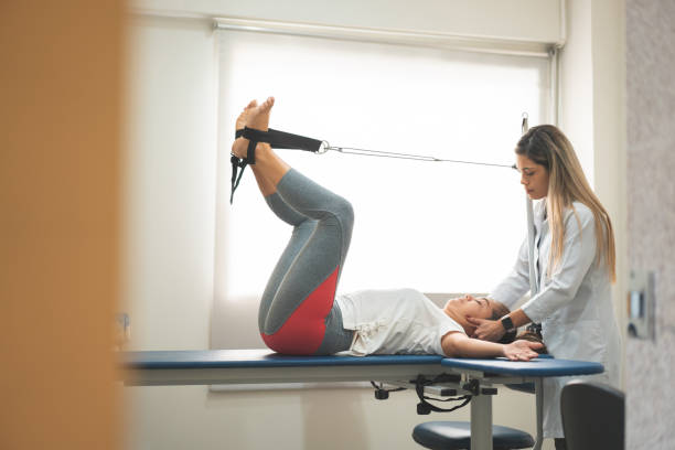 istock GPR - Global Postural Re-education, preparing the patient to correct the posture 1143592514