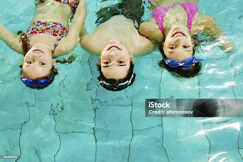 Teens in water  Adult Stock Photo