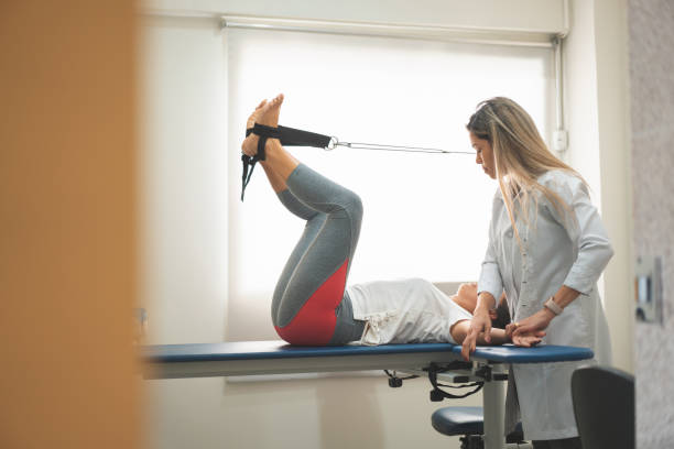 istock GPR - Global Postural Re-education, preparing the patient to correct the posture 1143594057