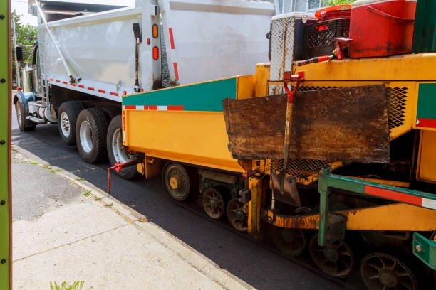 istock Close view on the road working on the new road construction site 1143598906