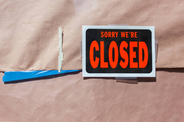 istock Business closed sign on the front door 1143602424
