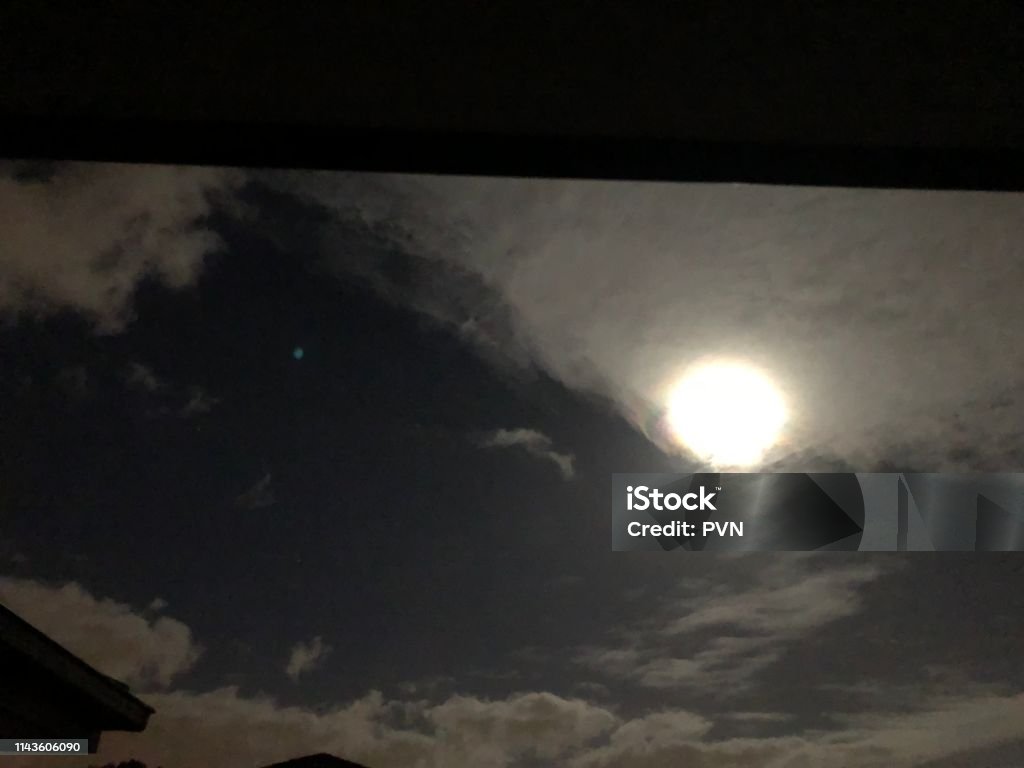 Full moon Super moon in a cloudy night Australia Stock Photo