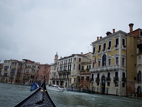 Venice, Italy-October 14, 2015: On a gondola traveling along the grand canal