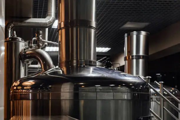 Craft beer production line in private microbrewery.