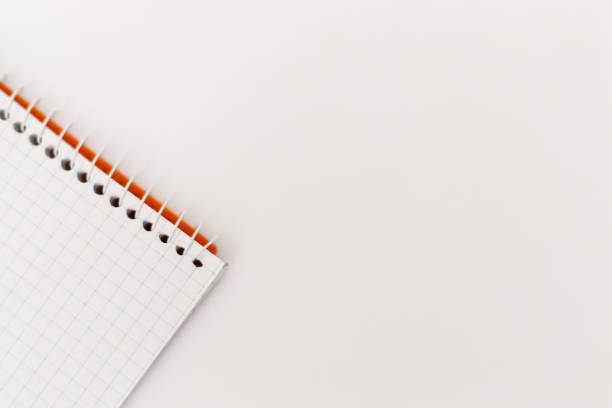 istock Top view of an open spiral blank notepad on a white background 1143611231