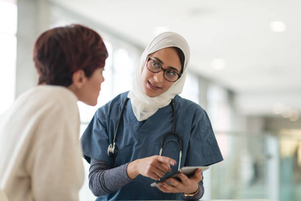 istock Muslim surgeon consults female patient 1143612709