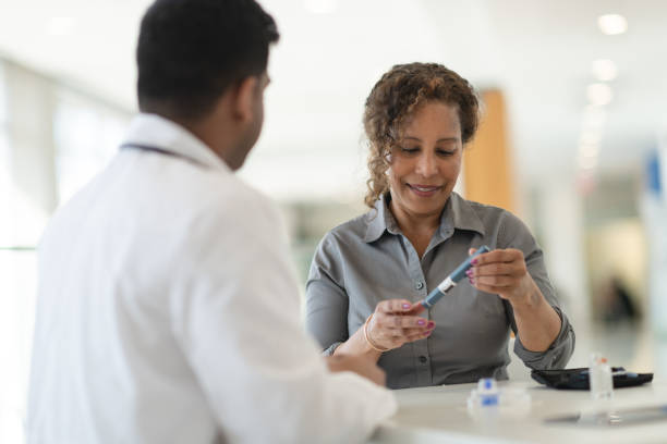 istock Diabetic patient meets with her doctor 1143612713