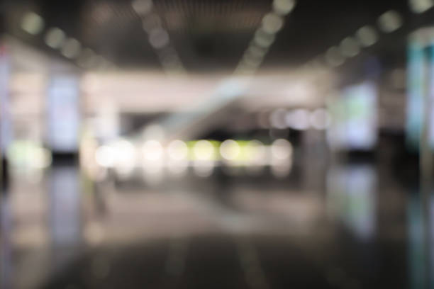 istock Blurred bokeh and people in shopping mall for background 1143615337