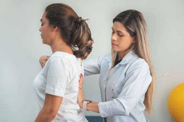 istock GPR - Global Postural Re-education, correcting the patient's posture 1143616495