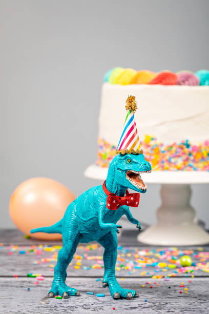 istock Toy Dinosaur at Birthday Party 1143616500