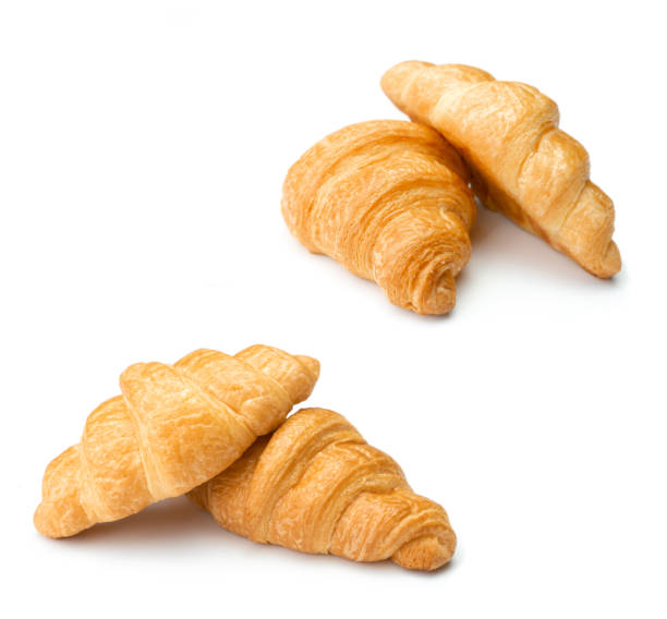 istock Croissants on isolated white background 1143619807