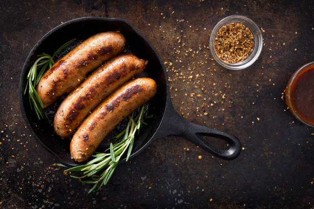 istock Sausages in a skillet 1143625026