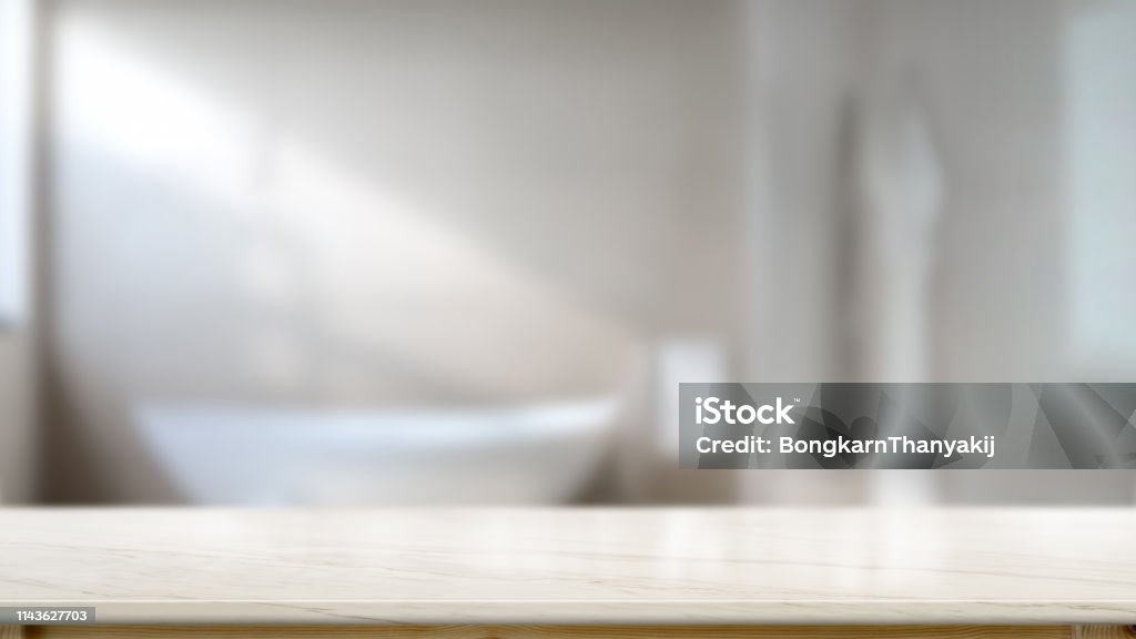 Empty top marble table counter in bath room for product montage Bathroom Stock Photo