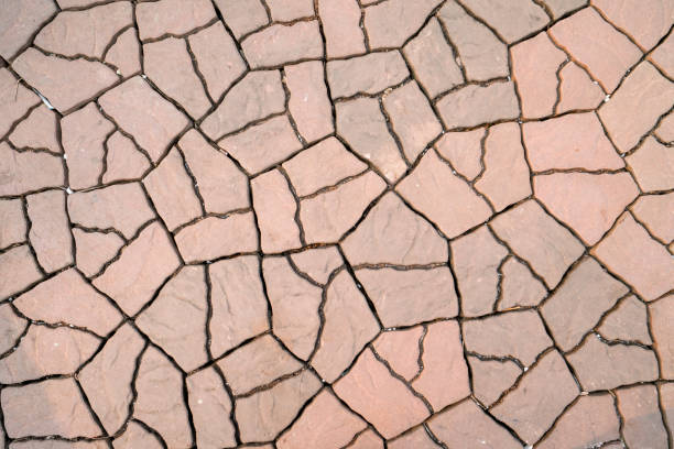 istock Beautiful seamless pattern of orange and brown cobblestones. 1143629885