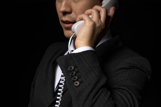 istock Men talking on the phone 1143630835