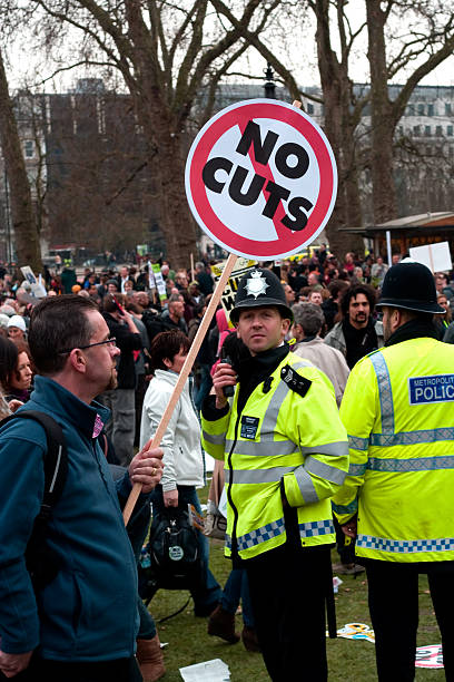 Metropolitan Police Officers monitor protestors at Hyde Park Corner stock photo