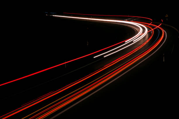 istock lights of cars with night 1143636564
