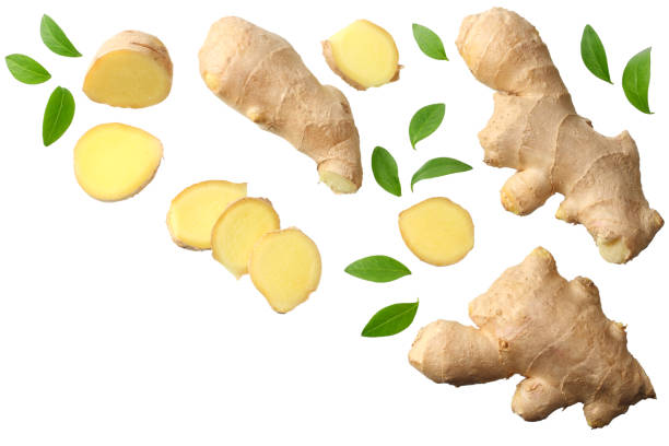 istock sliced ginger with leaves isolated on white background top view 1143645812