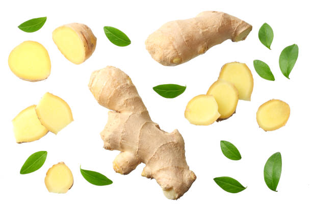 istock sliced ginger with leaves isolated on white background top view 1143645813