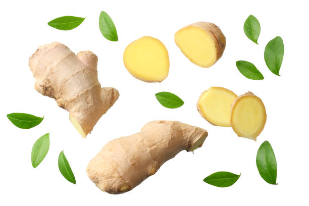 istock sliced ginger with leaves isolated on white background top view 1143645814