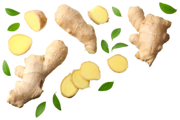 istock sliced ginger with leaves isolated on white background top view 1143645815