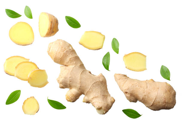 istock sliced ginger with leaves isolated on white background top view 1143645820