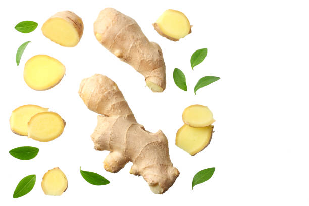 istock sliced ginger with leaves isolated on white background top view 1143645824