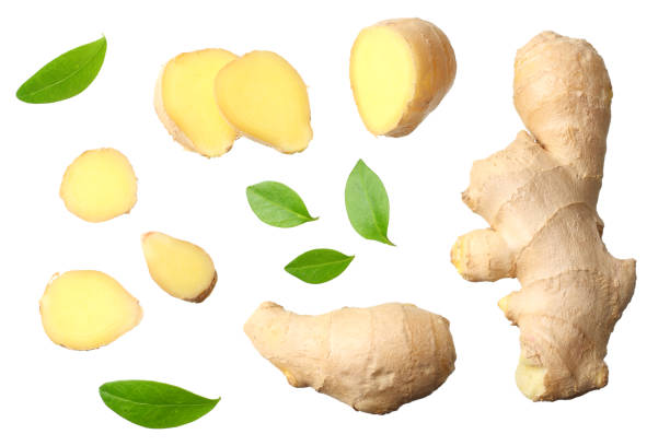 istock sliced ginger with leaves isolated on white background top view 1143645846