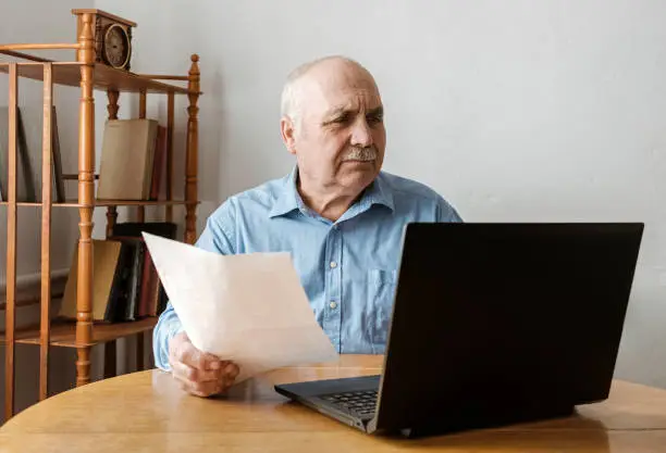 Photo of Perturbed worried senior business man