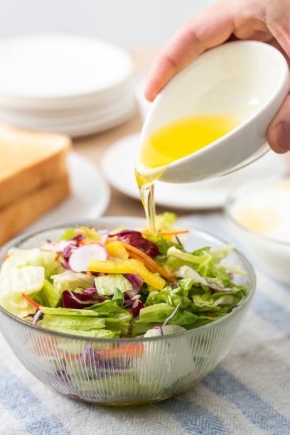 istock Vegetable salad and olive oil 1143653608