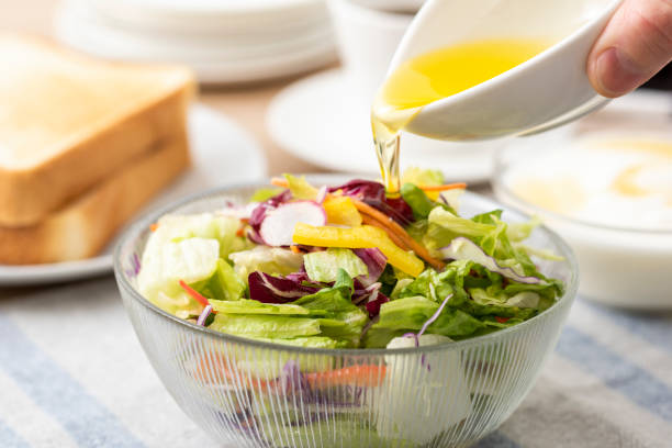 istock Vegetable salad and olive oil 1143653678