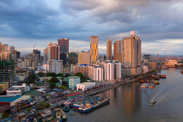 istock Some buildings and boats in Manila 1143654882
