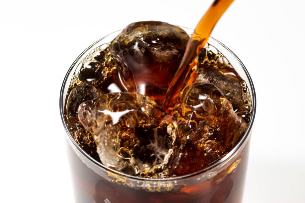 istock Pour iced coffee into a glass 1143654892