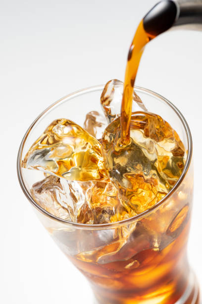 istock Pour iced coffee into a glass 1143654911