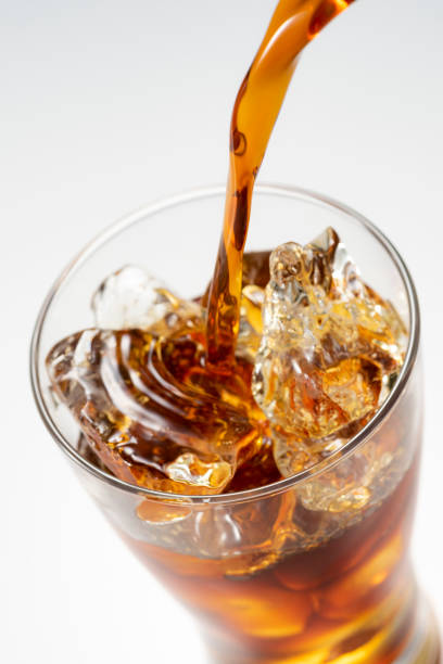 istock Pour iced coffee into a glass 1143654936
