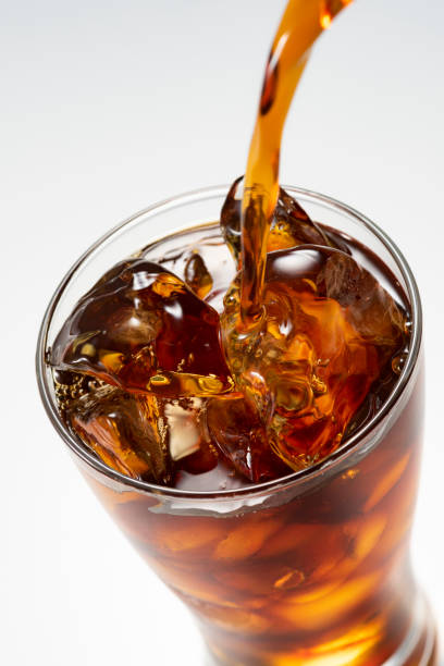 istock Pour iced coffee into a glass 1143655044