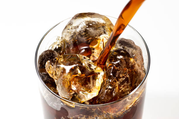 istock Pour iced coffee into a glass 1143655062