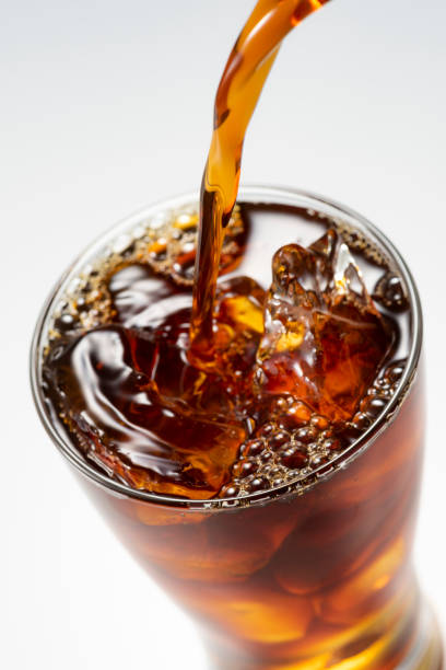 istock Pour iced coffee into a glass 1143655122