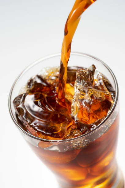 istock Pour iced coffee into a glass 1143655177