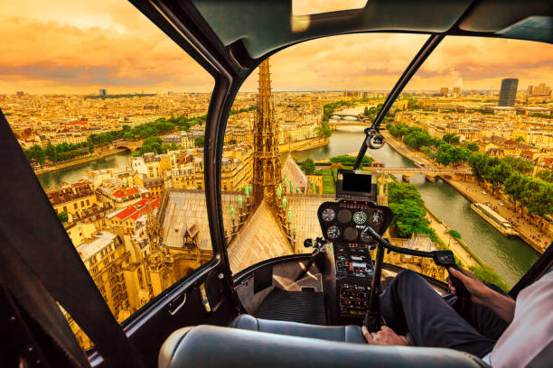 istock Helicopter on Notre Dame at sunset 1143655603
