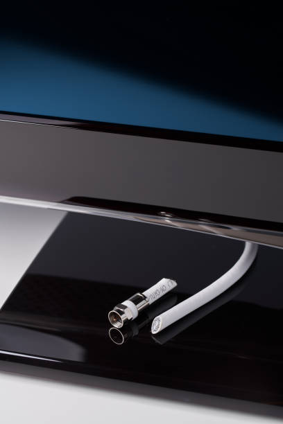 istock Cord cutting: cutting coaxial cable on television 1143656592