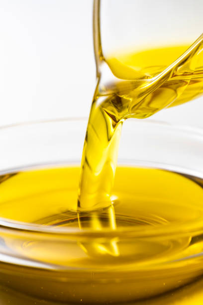 istock Pour olive oil into the bowl 1143658911