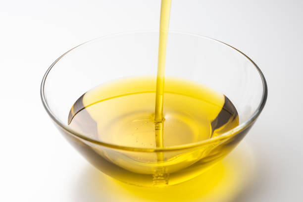 istock Pour olive oil into the bowl 1143658987