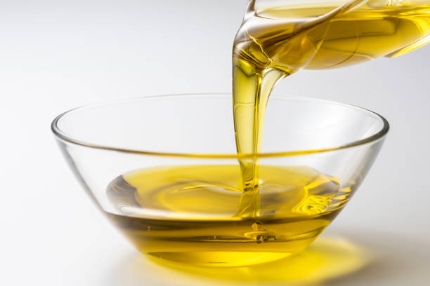 istock Pour olive oil into the bowl 1143658992