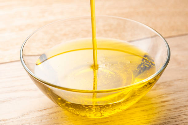 istock Pour olive oil into the bowl 1143659036