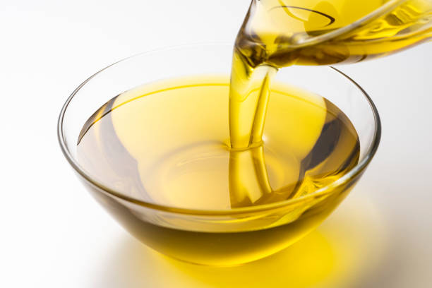 istock Pour olive oil into the bowl 1143659043